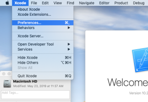 Xcode menu open with Preferences option selected