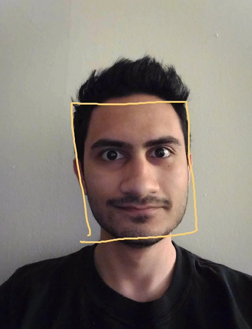 Man with square around face representing face detection