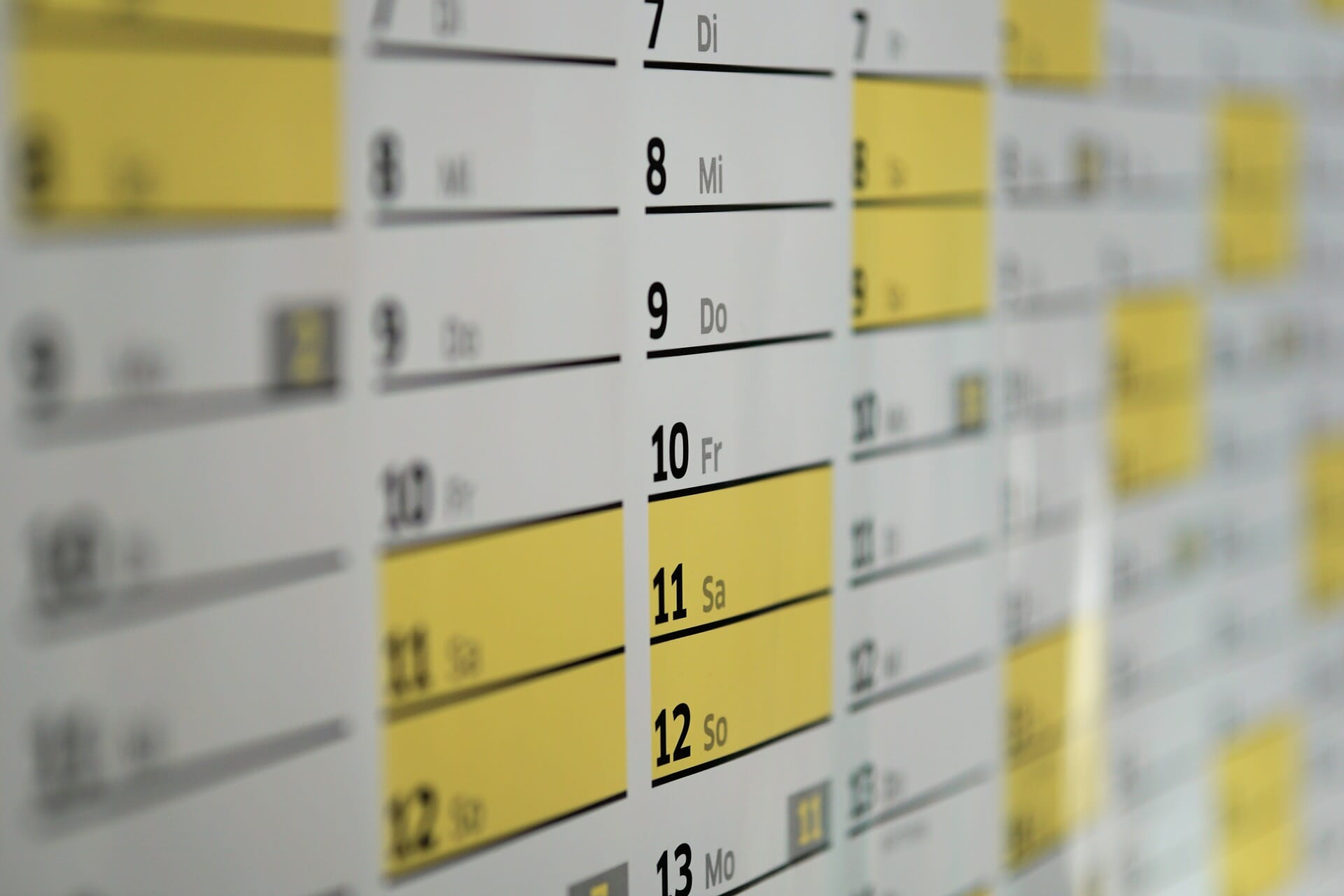 Day planner with some dates highlighted in yellow