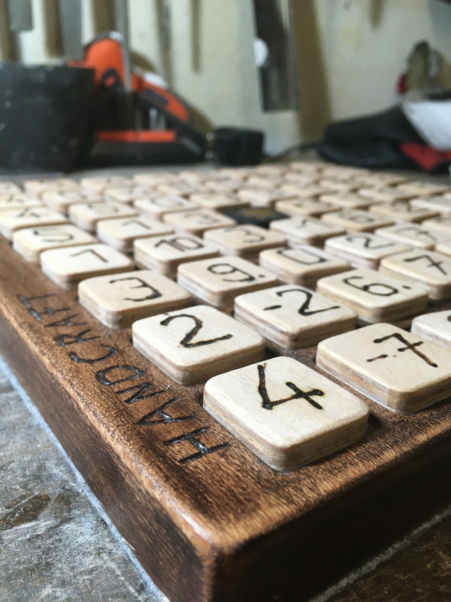 Home made numbers game made out of wood